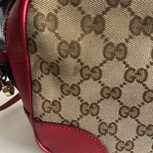 Red/beige monogram genuine Gucci crossbody bag….